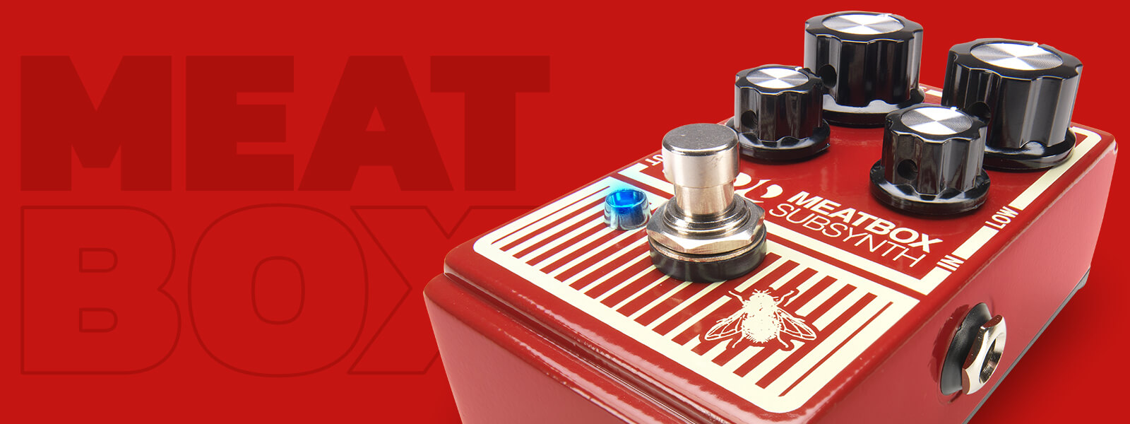 DOD Meatbox distortion guitar pedal on matching red background